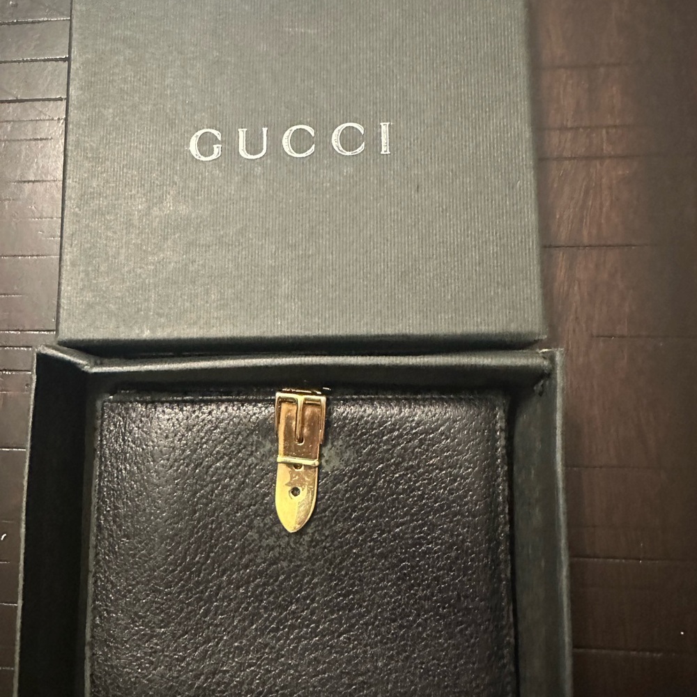 Vintage gold gucci clasp wallet